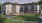 a building with a lawn in front