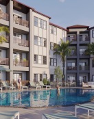 a pool in a courtyard between buildings