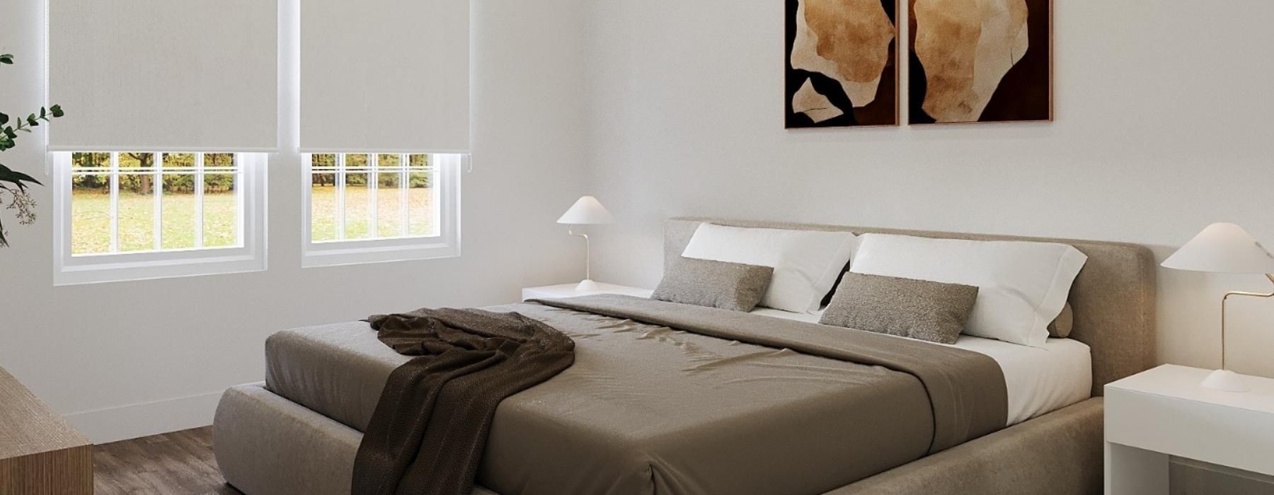 a living room with a couch and a painting on the wall