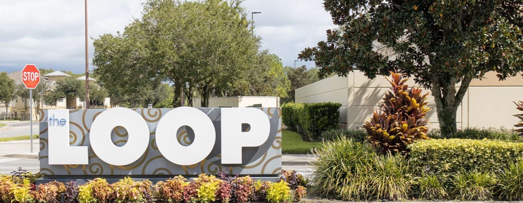 The Loop Kissimmee outdoor shopping center entrance sign.